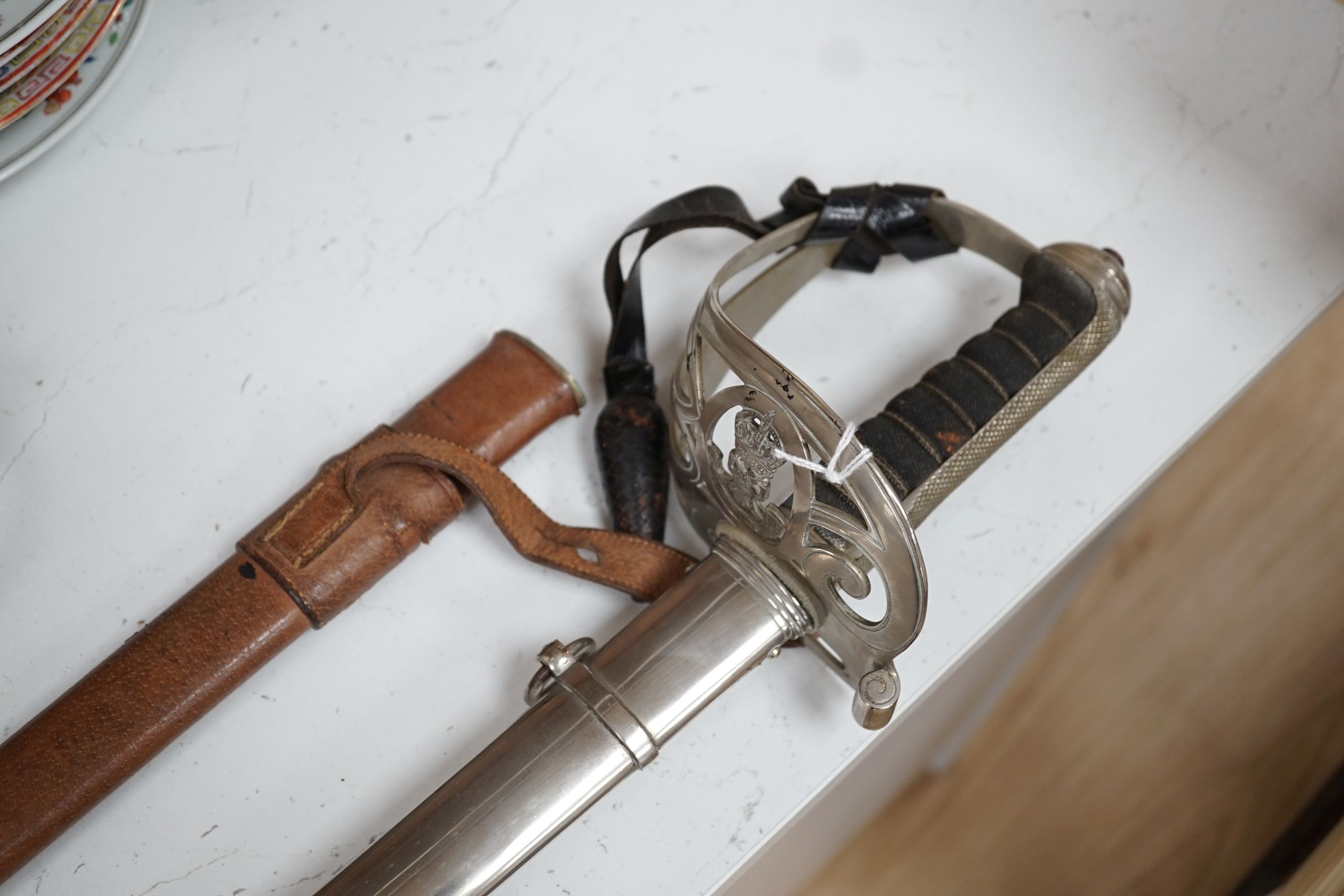 An Edward VII officer’s dress sword with leather case - 102cm long